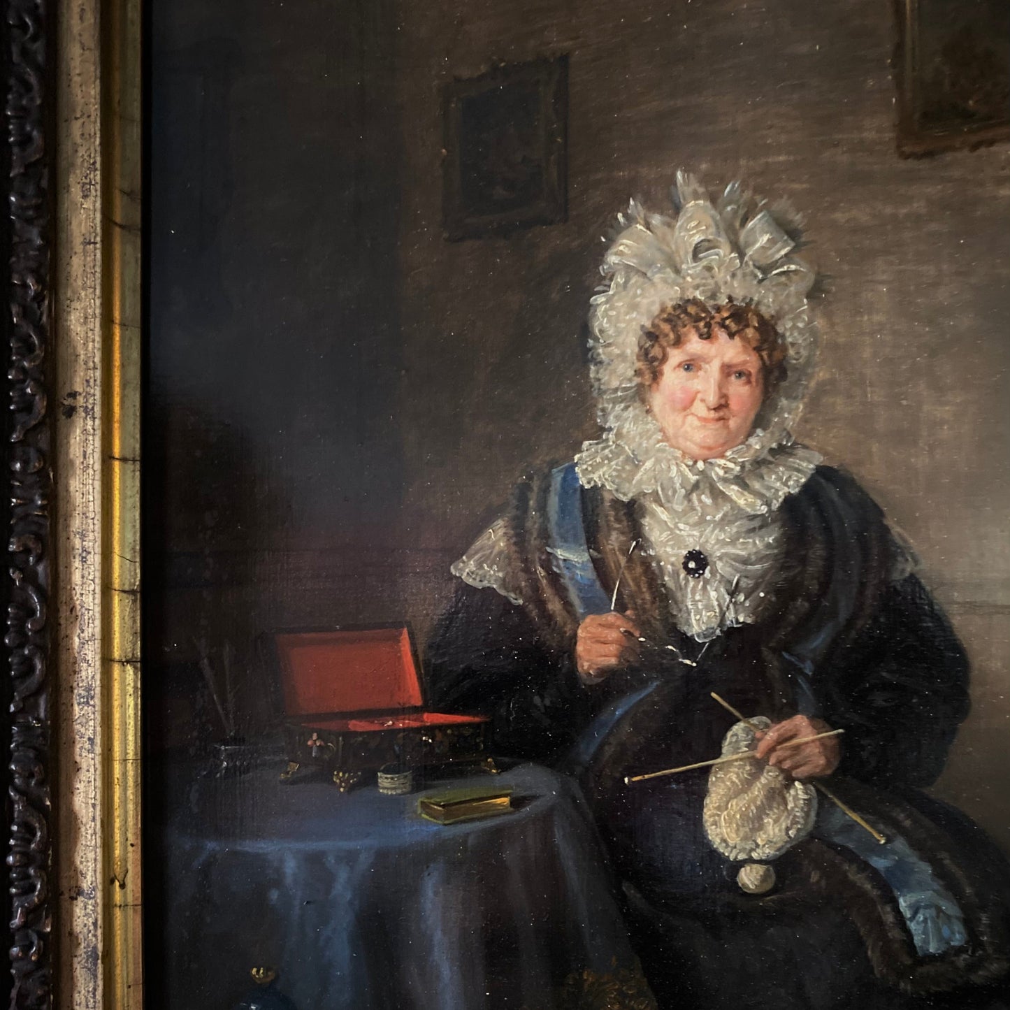 'Lady at the Table with Knitting Material' by Edmund Bristow C.1830