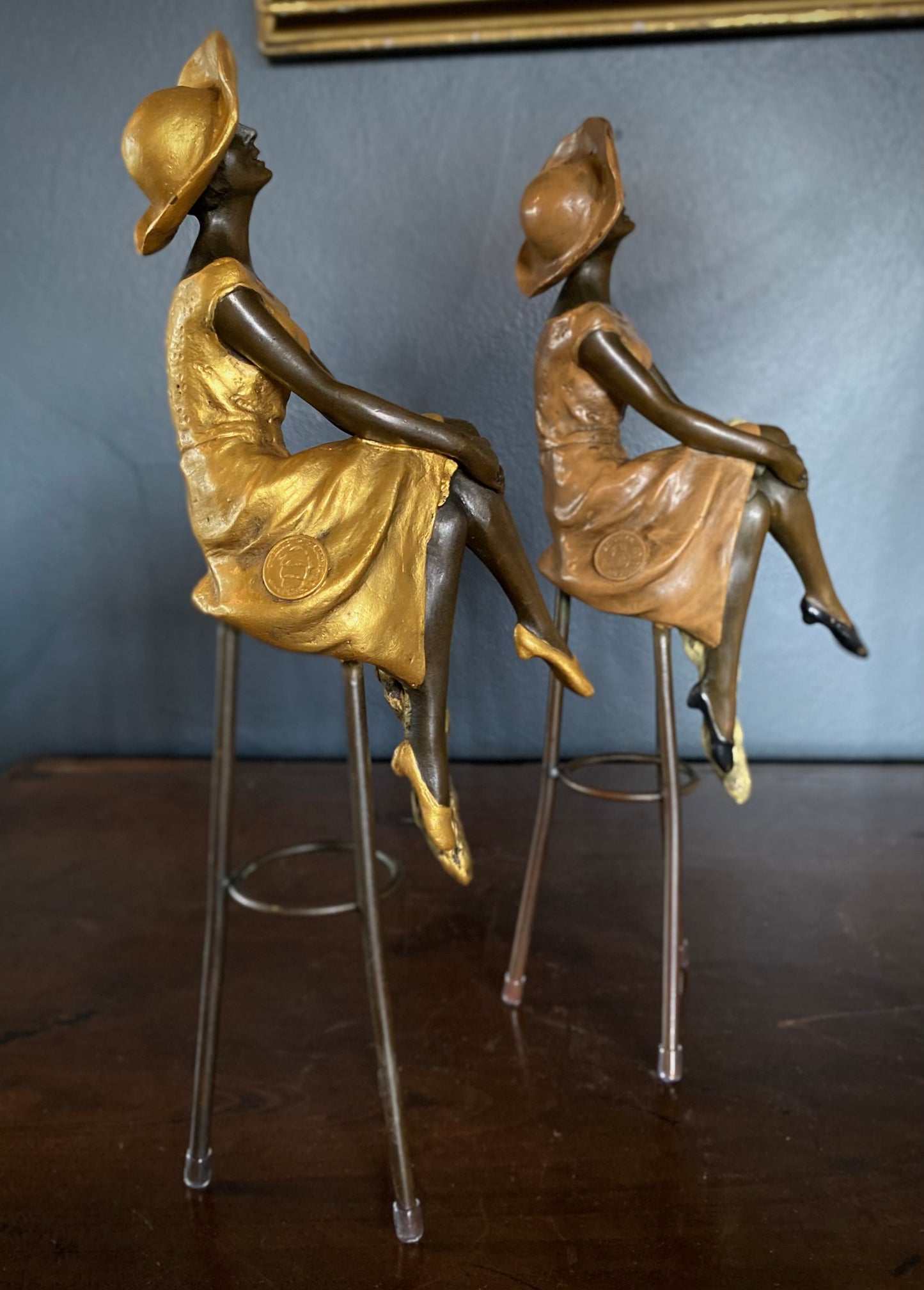 Pair of Bronze Seated Ladies