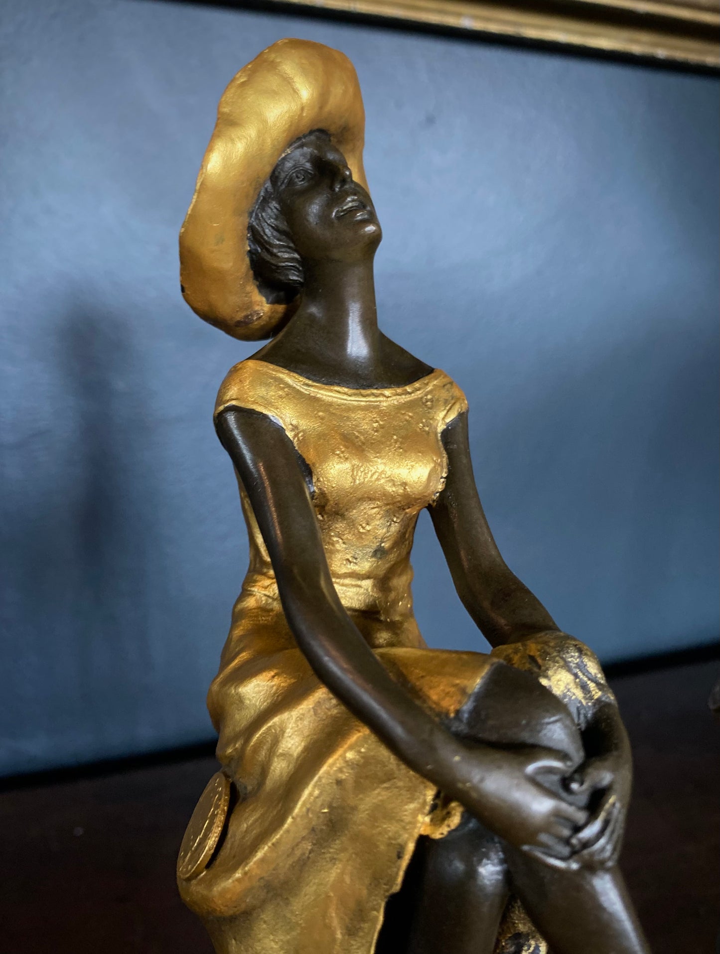 Pair of Bronze Seated Ladies