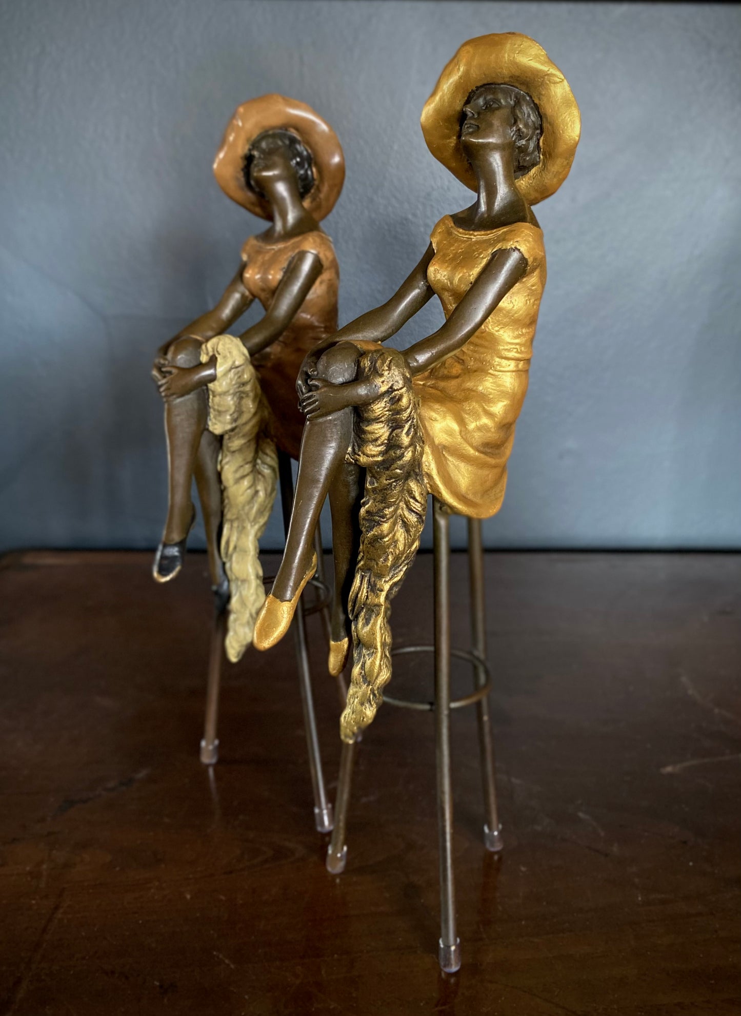 Pair of Bronze Seated Ladies